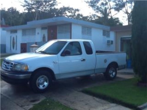 Ford f 150 2001 cabina y 12 4.2L $5,295 omo