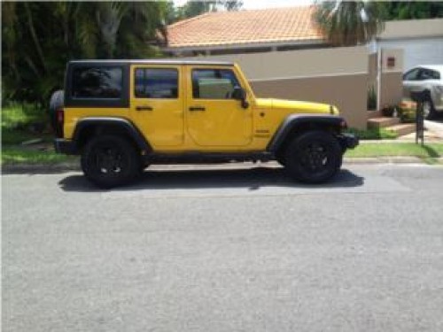 Jeep wrangler solo 16mil millas amarilla2011