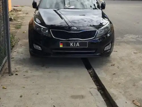 Kia K5 2015 mamey pitado de negro