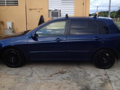 Kia Spectra5 76,000millas $4,000fijos