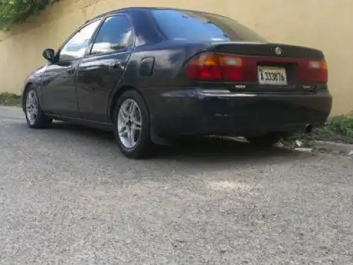 Mazda 323 1995 transmision mecanica 