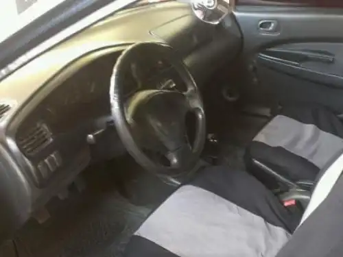 Mazda 323 1995 transmision mecanica 