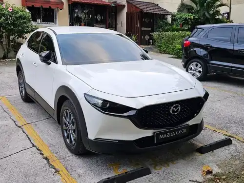 Mazda cx-30 2024, cambios en el volante, sonido profesional, cinturone