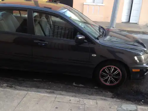 Mitsubishi Lancer  2002  