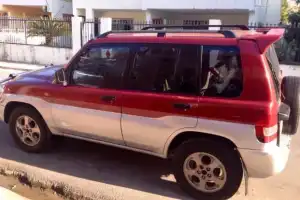 Mitsubishi montero 2002 io roja negociable 