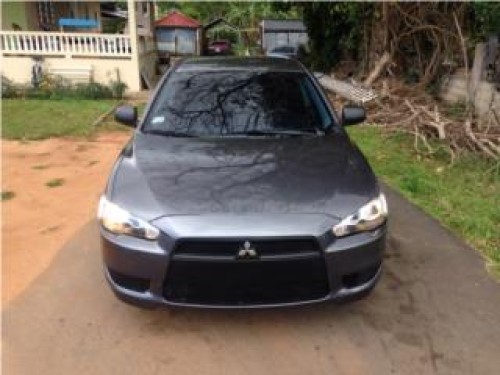 Mitsubishi Lancer 2009 precio 7,500 sv o ck