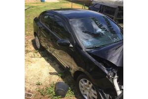 NISSAN SENTRA CHOCADO DE FRENTE 2010