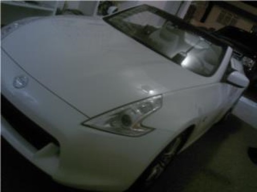 NISSAN TOURING CONVERTIBLE 2010 BLANCO PERLA