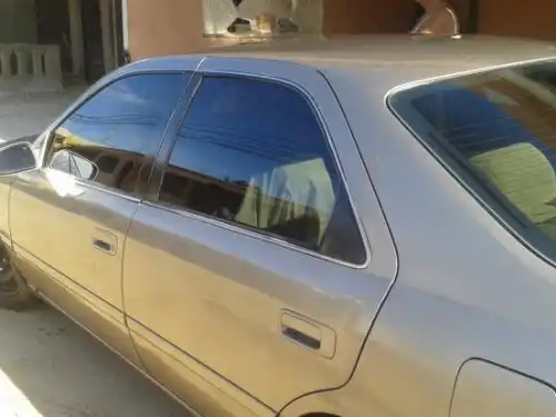 Toyota camry 2001 CE dorado 