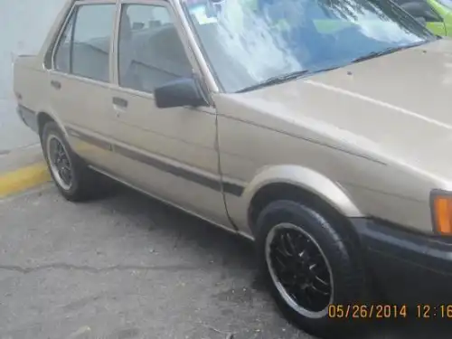 Toyota corolla 1987 dorado 