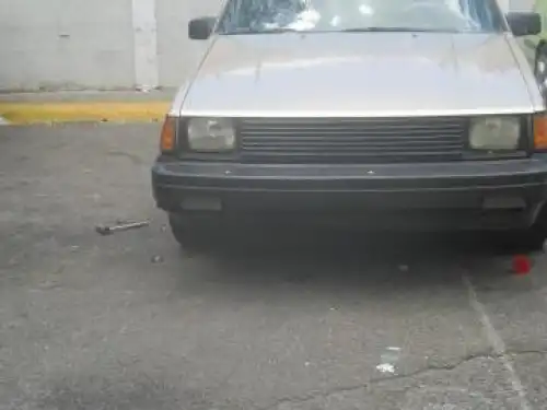 Toyota corolla 1987 dorado 