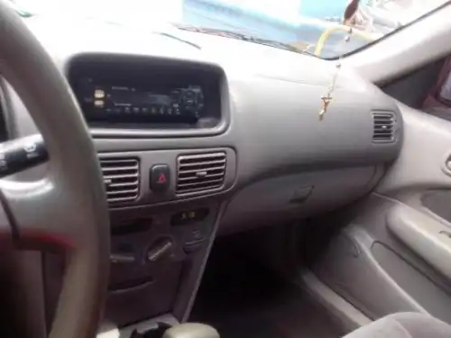 Toyota corolla 2001 rojo como new 