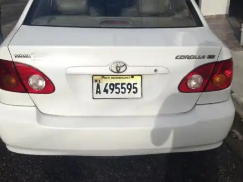 Toyota corolla 2003 blanco con aros de magnesio 