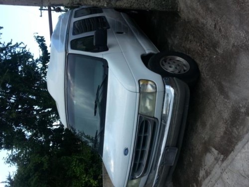 ford van 150 aÃ±o 93 color blanca, customizada