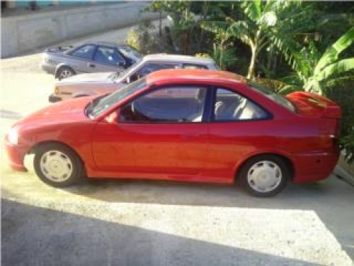 mitsubishi mirage rojo 97 negoceoo